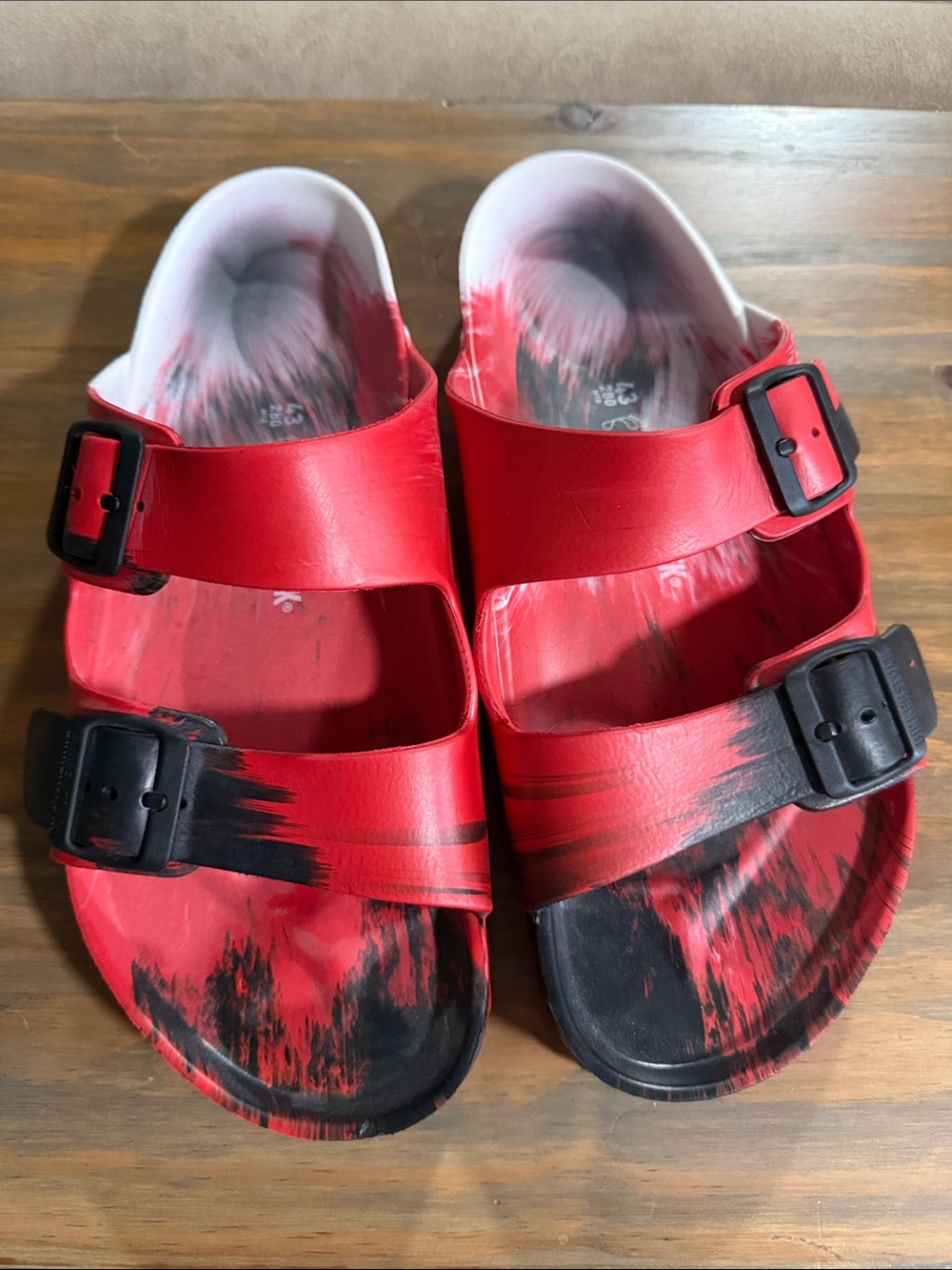 Birkenstock Two-Strap Slide Sandals with Black and red Accents. Size 43